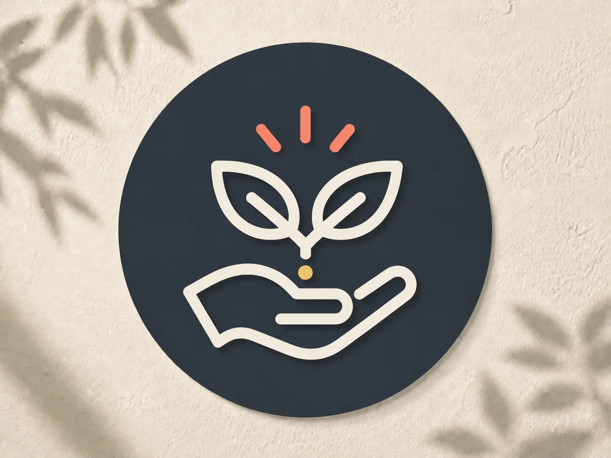 A sprouting plant held in an open hand, representing purposeful everyday wellness