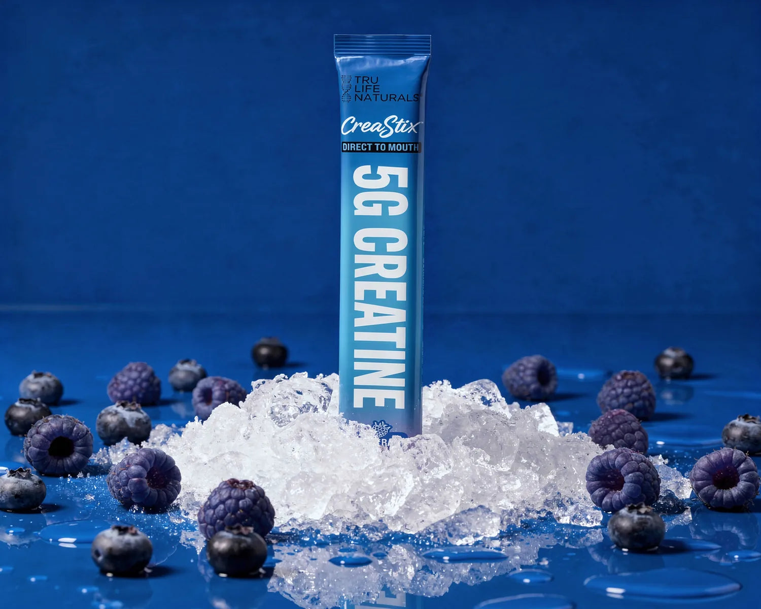 Blue Razz CreaStix stick standing in crushed ice with blue raspberries