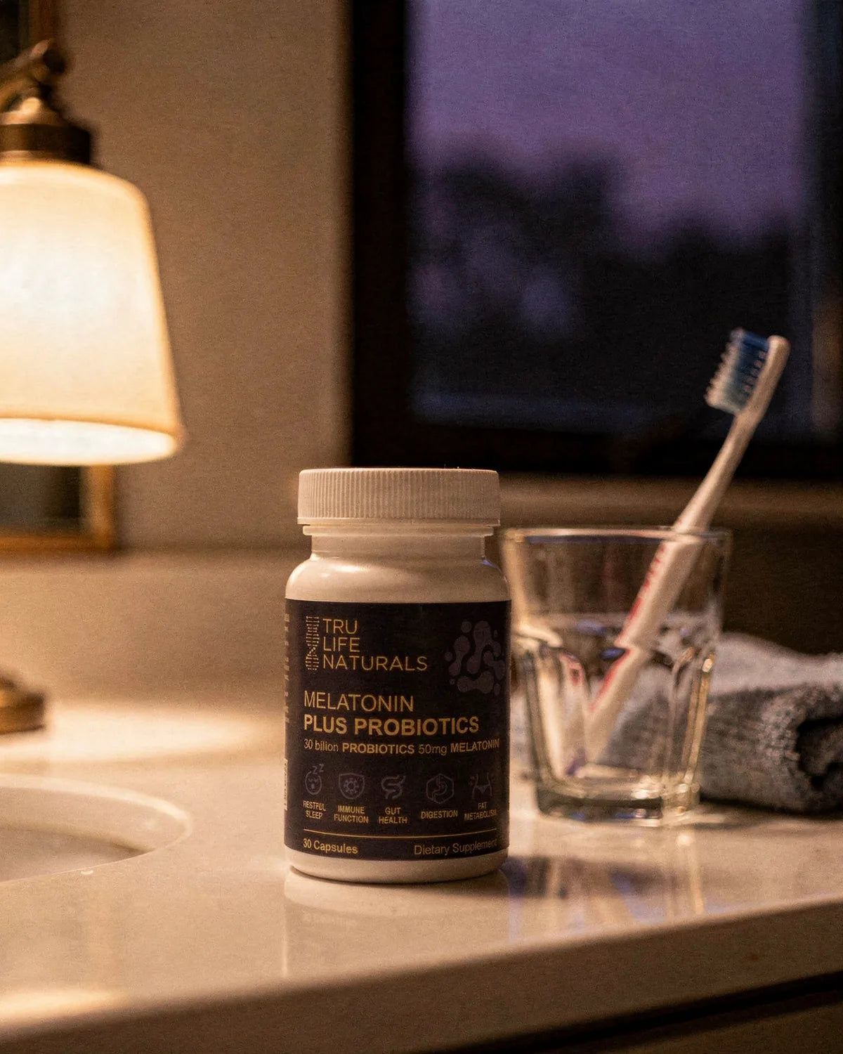 Melatonin Plus Probiotics bottle on a bathroom counter next to a toothbrush