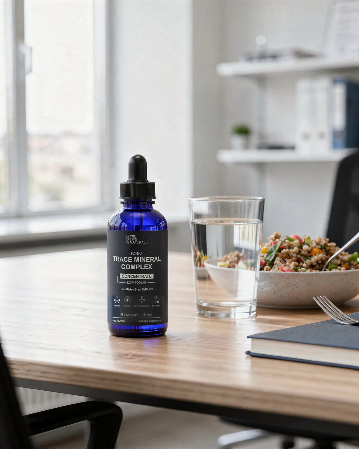 Trace Mineral Complex 4 oz bottle on an office desk at lunch