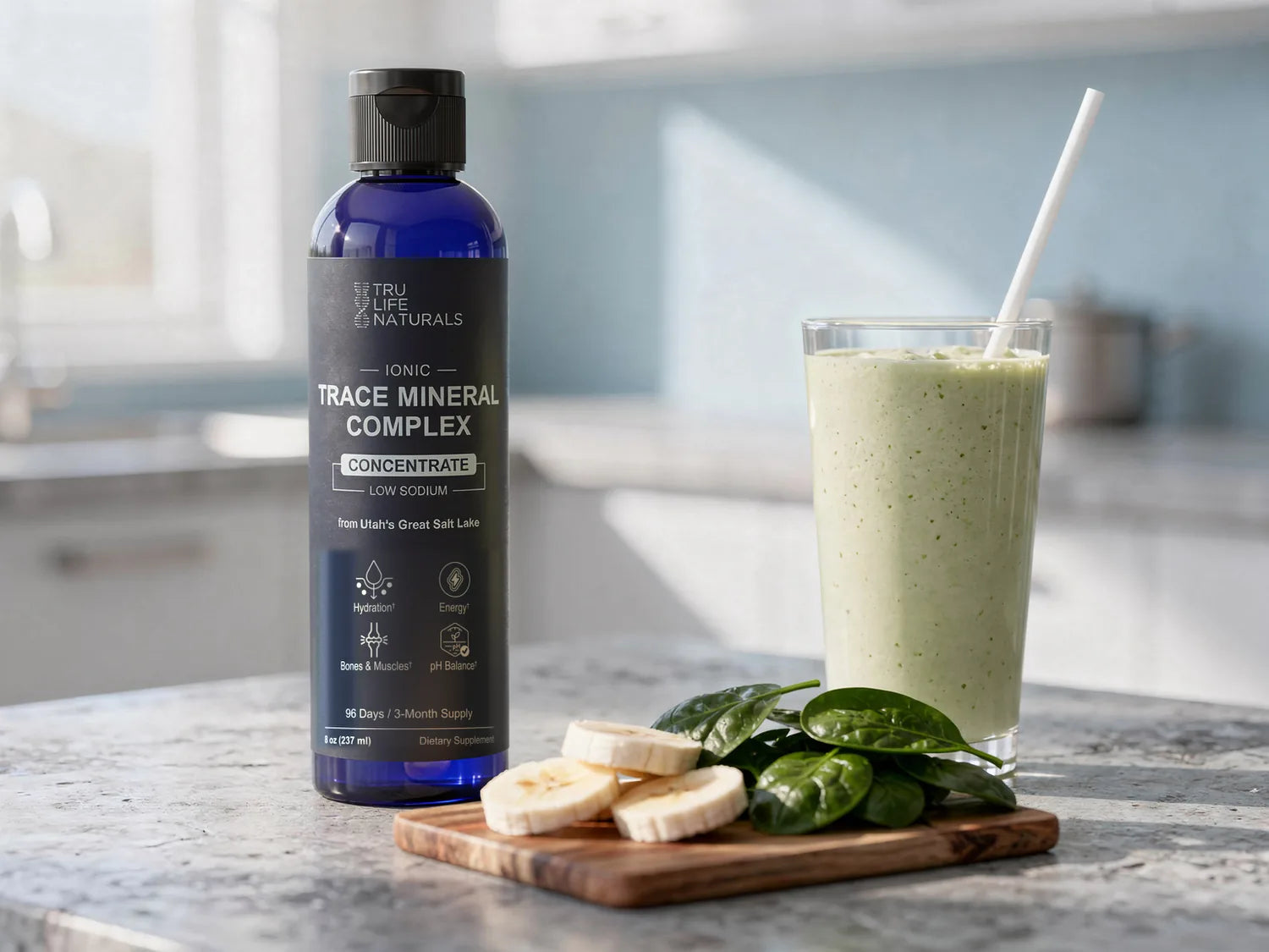 Trace Mineral Complex 8 oz bottle next to a green smoothie on a kitchen counter